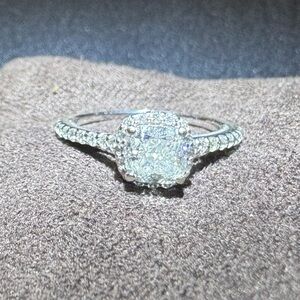 18k White Gold engagement ring w/ Rose Gold heart loop. Natural diamonds.